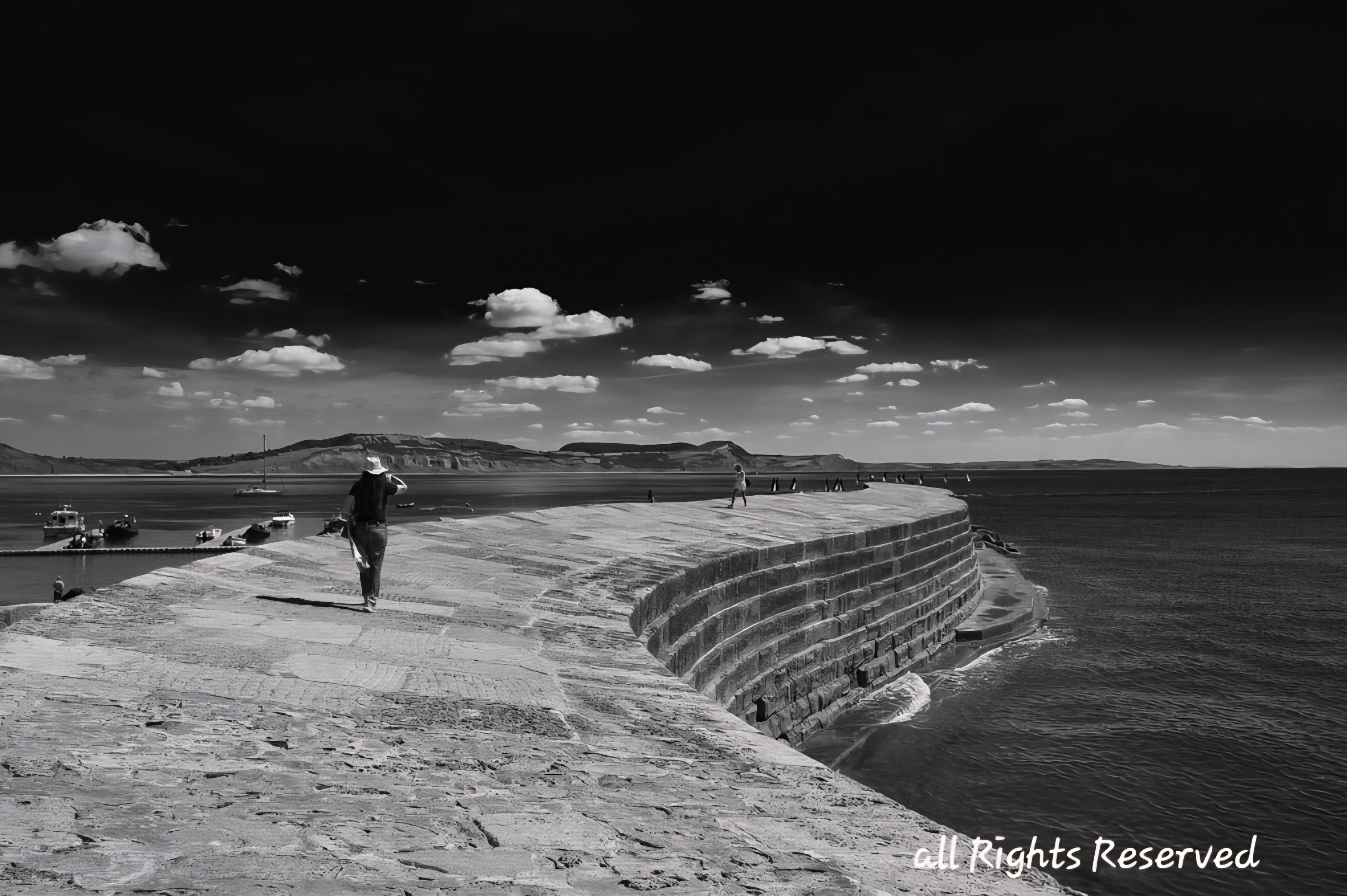 Notice a woman walking on marina wall, which already had wonderful leading lines....