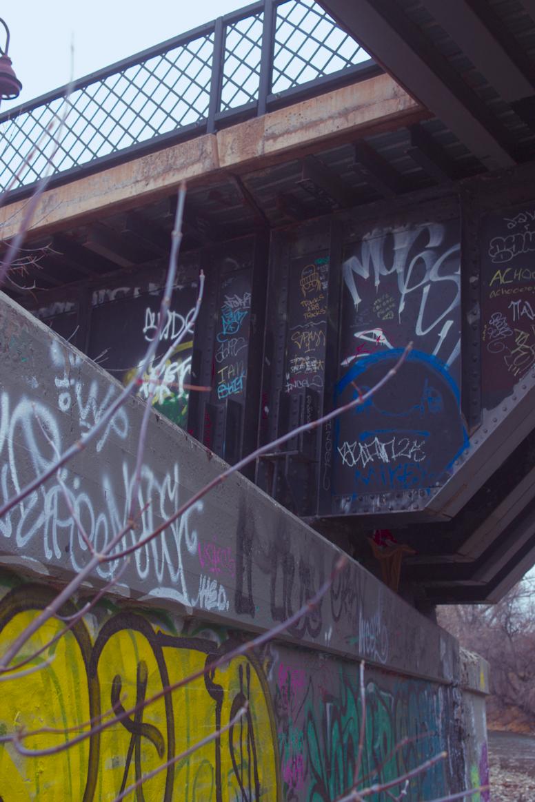 Angle shot at a bridge and its support with various fill ins and tags.