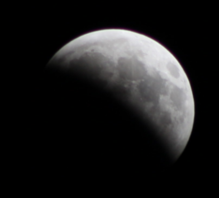 the moon, eclipses, almost 50% gone now