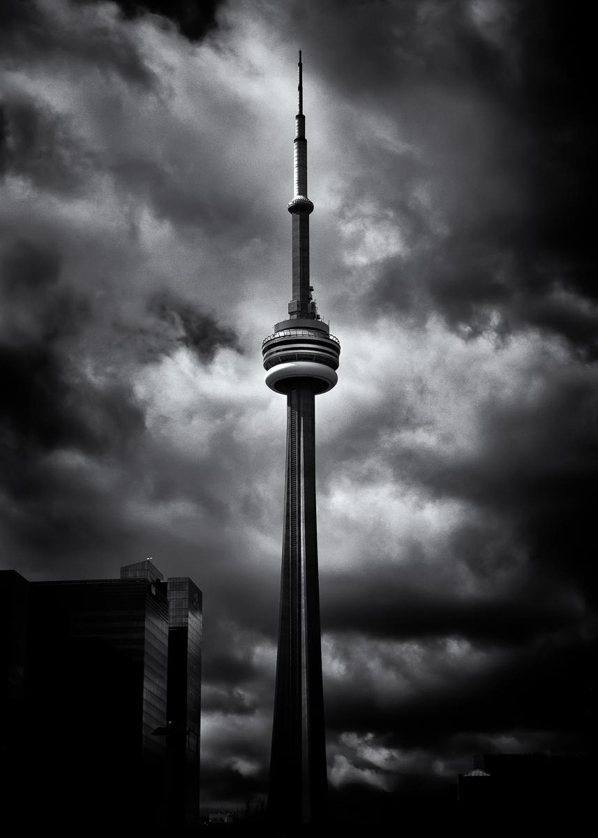 CN Tower No 5.

After 5 years of planning, construction on the CN Tower began in 1973 and at a cost of $63,000,000 CDN, the 553.33 m (1,815.4 ft) tower was completed in 1976 and became the world's tallest free standing structure, a record it held for 34 years.

Canon EOS 60D
Sigma 17-70mm f2.8 DC Macro OS
Silver EFEX Pro