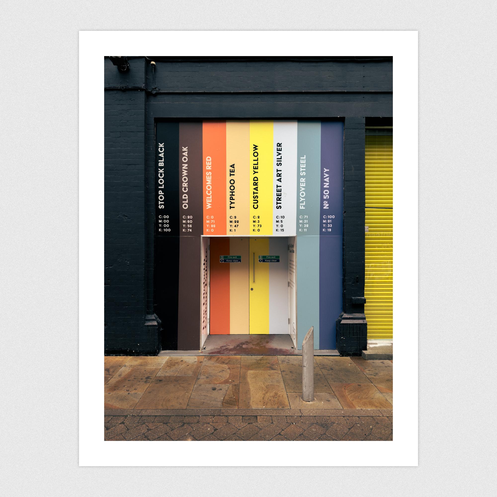 A colour palette painted onto the entrance to a building.