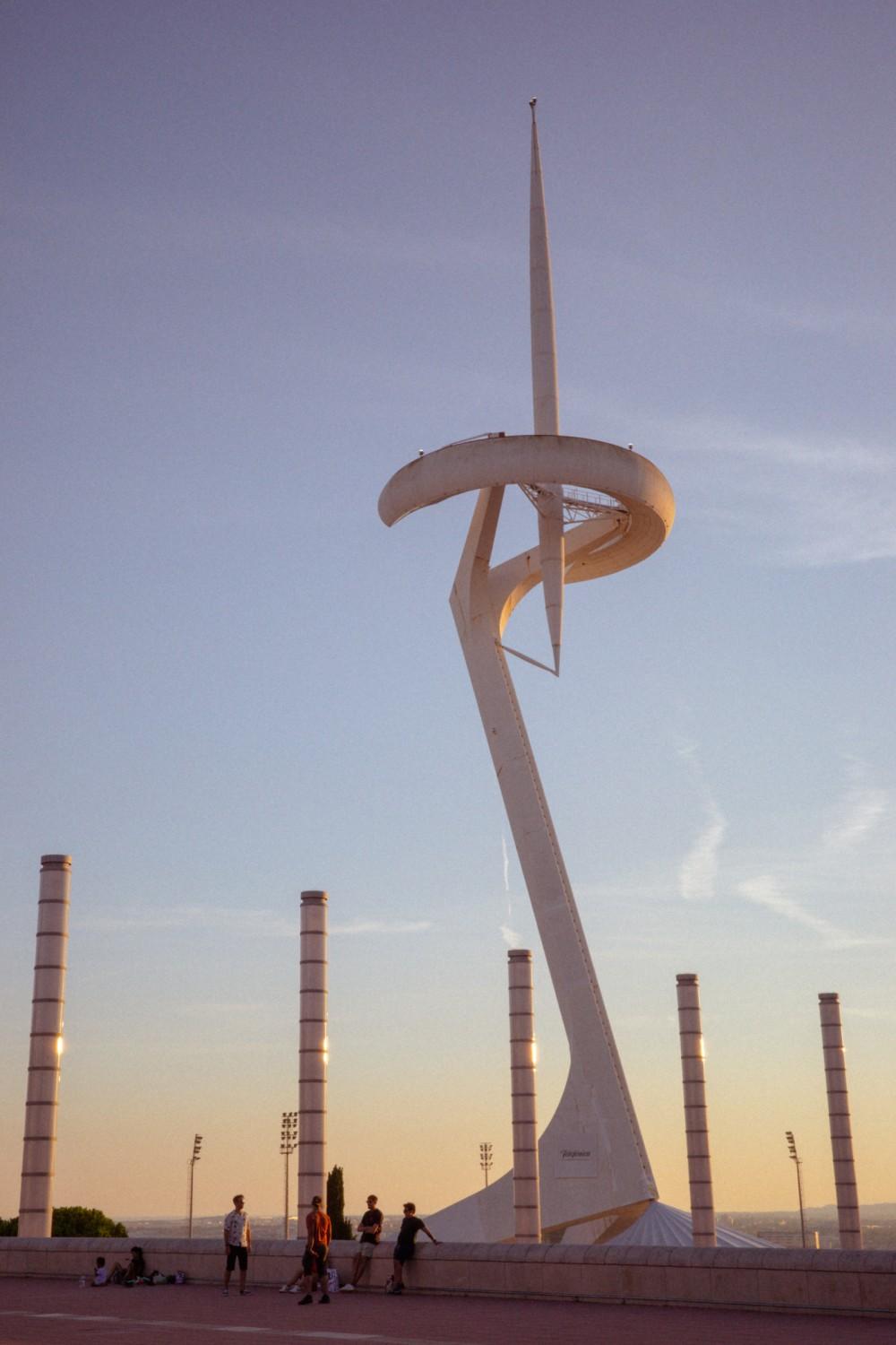 Photograph of the Olympic Port park at sunset, with the Olympic Ring in the background.