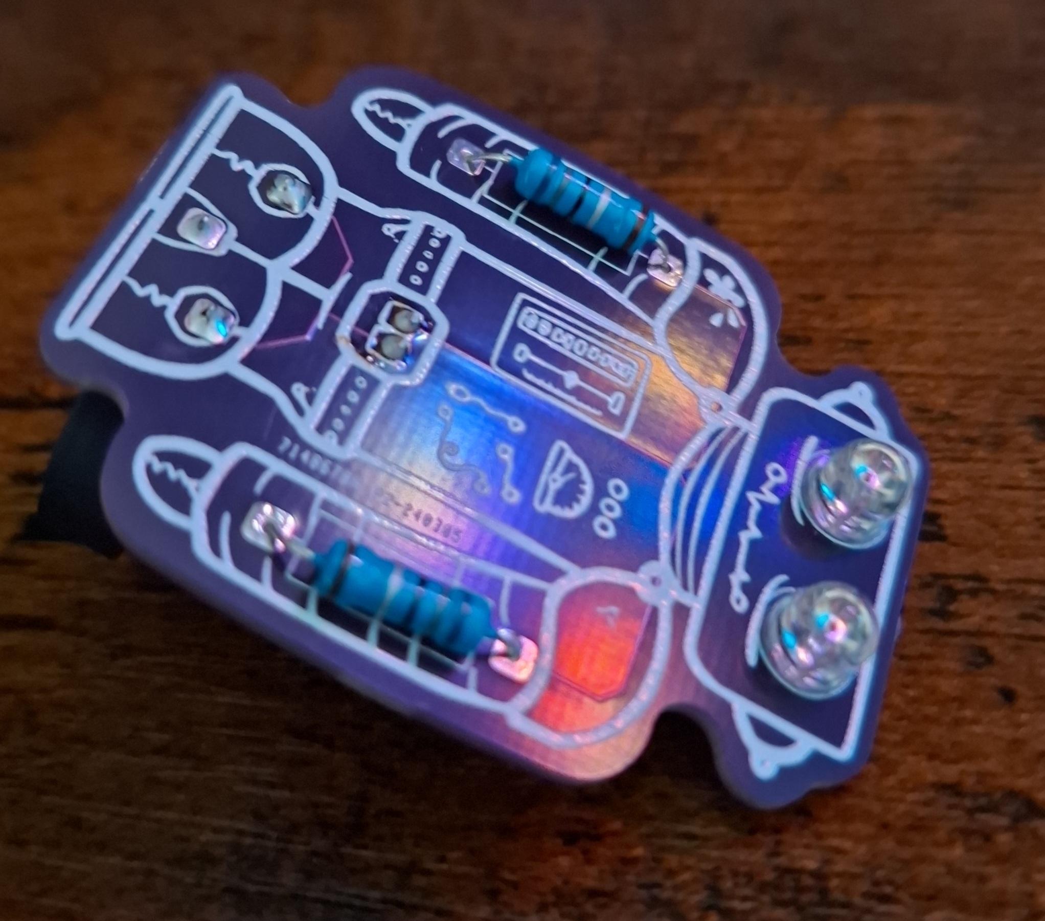 Sleepybot lying down. Their eyes are not lit up