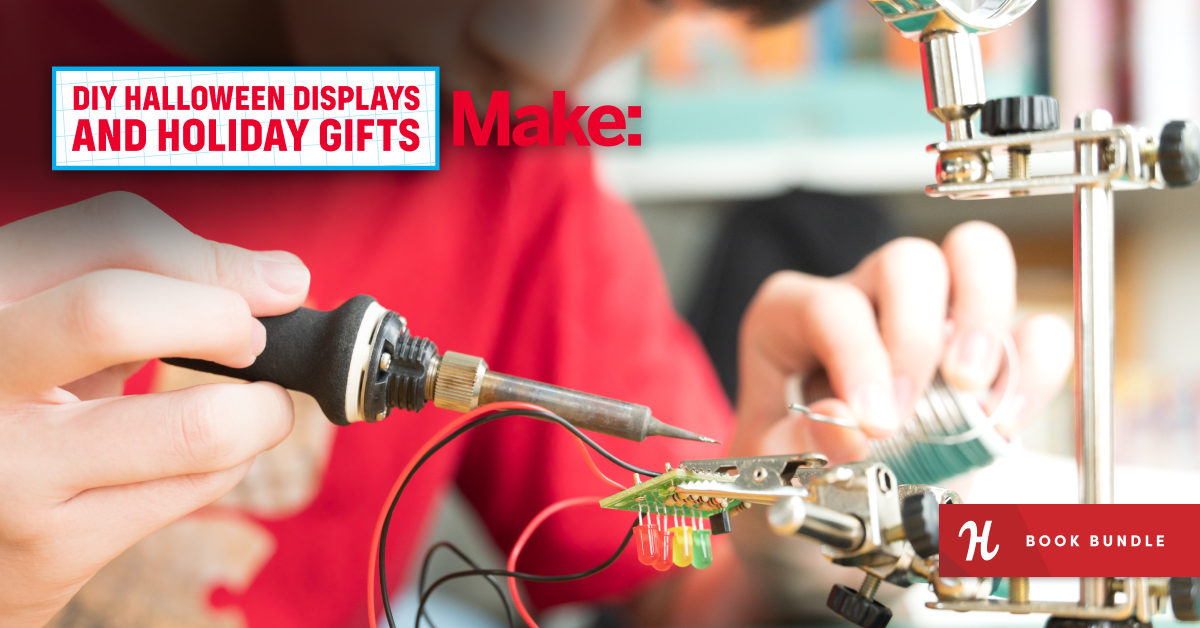 A person is soldering electronic components on a circuit board, focused on creating DIY Halloween displays or holiday gifts.